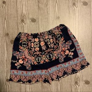 Size small summer shorts. Stretchy with a tie at the waist and pockets.